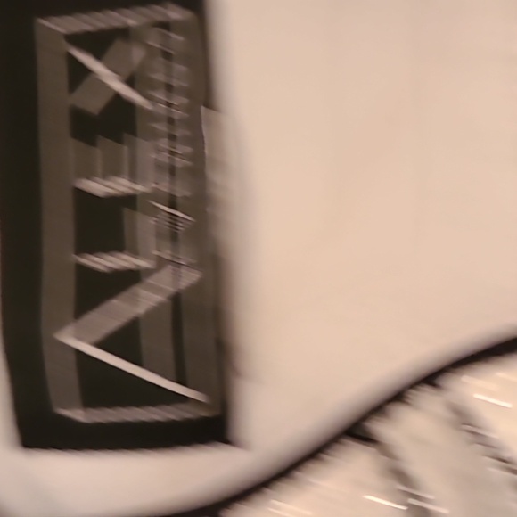 An evening jacket with white as the dominant color. Cardigan front long sleeves - Picture 3 of 5